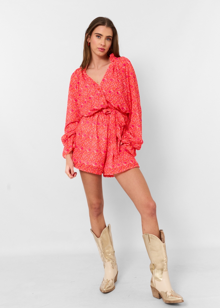 Jazzy playsuit oranje