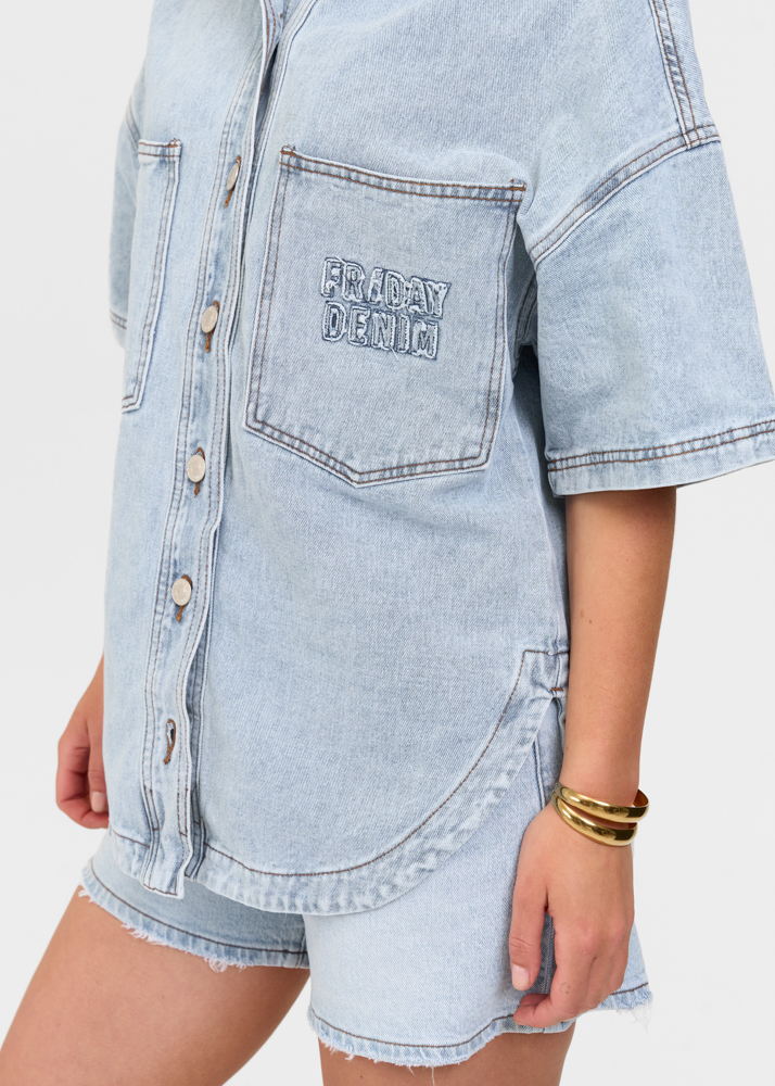 Oversized denim blouse korte mouw