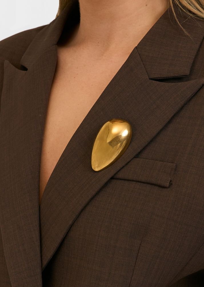 Suus broche